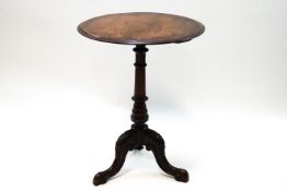 A Victorian mahogany snap top occasional table on turned pedestal and carved cabriole legs,