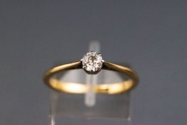 An early 20th century gold and diamond solitaire ring, the old-cut stone approx 0.