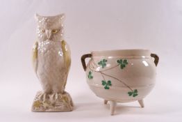 A Belleek porcelain cauldron vase, black printed factory mark, 13cm high, and a Belleek owl vase,