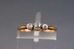 An early 20th century small graduated old-cut diamond three stone ring, the old-cut diamonds approx.