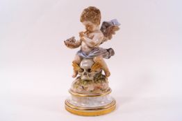 A 19th century Meissen porcelain figure of a cherub sitting upon a skull with sheafs of corn within