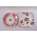 An early 19th century plate, probably Minton,painted with roses,