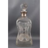 An Asprey silver mounted clear glass 'dimple' decanter and stoppr,