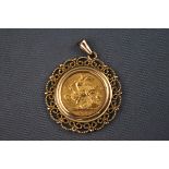 A half Sovereign dated 1902, in 9ct scroll mount 6.