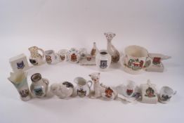 A quantity of Goss and other crested china including cats and jugs