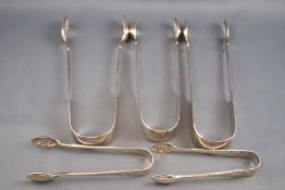 A five silver sugar tongs, various dates and makers, 5.