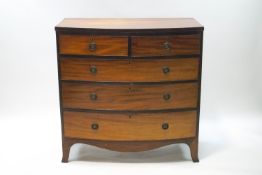 A 19th century mahogany bow front chest of two short over three long drawers,