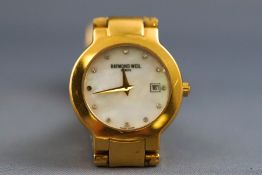 A ladies gold plated Raymond Weil wristwatch.