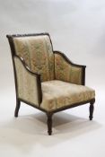 A Regency style mahogany armchair with carved Classical motif detail,