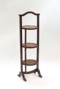 A Victorian mahogany three tier folding cake stand,