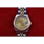 A bi colour ladies Rolex Oyster perpetual datejust watch.