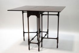 A George III style mahogany spider leg table, 68.