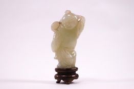 A Chinese jade carving of a robed man, 5.