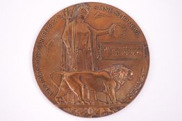A WWI bronze death plaque,