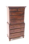 A doll's house cross-banded mahogany chest on chest,