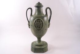 A painted bronze two handled Classical urn,