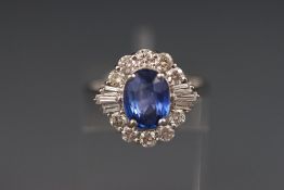 An 18ct white gold fine sapphire and diamond cluster ring. Sapphire 2.
