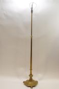 A Victorian style brass standard lamp with six sided base,