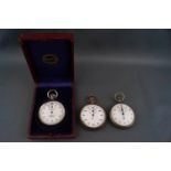 Three pocket stopwatches, including a boxed example by Marcks & Co,