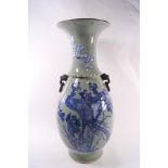 A large Chinese celadon table lamp, decorated with mythical birds and flowering plants,