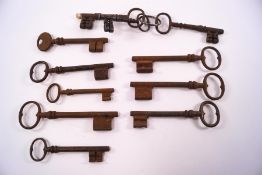 A collection of eleven iron furniture keys