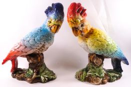 A pair of Italian earthenware models of parrots,