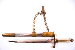A Bulgarian Naval dress dagger and sheath with gilt metal mounts and hanging chain, blade 23.