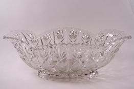 A large cut and pressed glass dish with pineapple design,