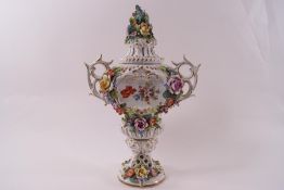 A Sitzendorf porcelain pot pourri vase and pierced cover,
