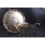 A silver plated salver with beaded and leaf border,