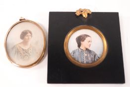 A Victorian portrait miniature of a lady wearing a striped dress and locket, watercolour on ivory,