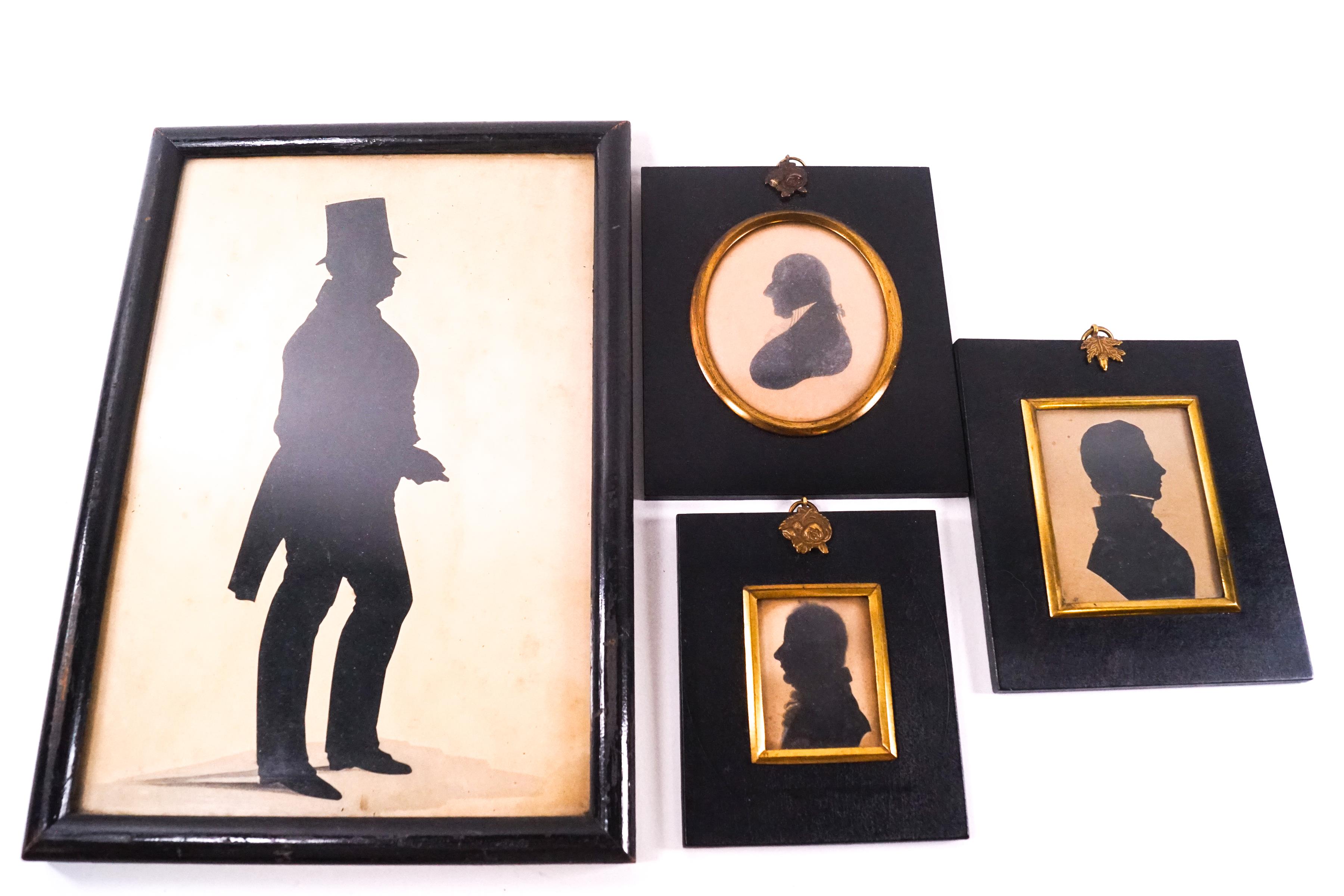 Three 19th century silhouettes of Gentlemen,