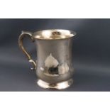 A silver pint mug with a baluster body and double scroll handle, Sheffield 1950, by Emile Viner,