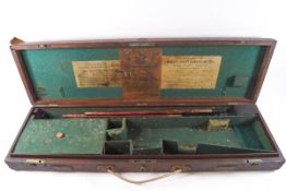 A Westley and Richards & Co oak gun case;