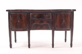 A doll's house mahogany sideboard, two central drawers flanked by cupboards,