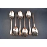 A collection of six silver tea spoons, each engraved with a "C", by Walker and Hall,