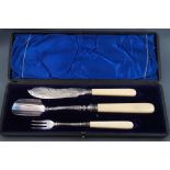 A Victorian cheese scoop, together with matching pickle fork, both with ivory handles,