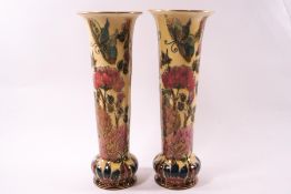 A pair of Zsolnay Pec earthenware vases of tapering cylindrical form,
