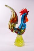 A Murano glass multi-coloured cockerel on a spiral twist base,