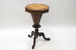 A Victorian walnut work and games table,