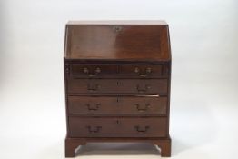 A George III mahogany bureau,