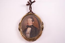 A Victorian portrait miniature of a Gentleman, watercolour, within a gilt metal frame, 5.