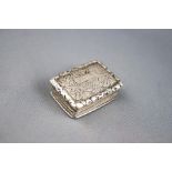 A George IV silver vinaigrette, engraved with leaves,