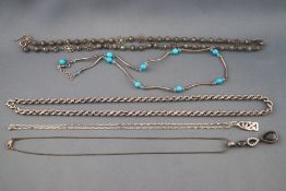 A selection of five silver necklaces consisting of two pendant and chains,