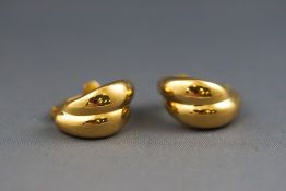 A pair of yellow metal hollow clip on earrings, stamped 750. 5.