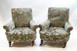 A pair of Victorian armchairs in the Howard & Sons style,