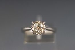 A white metal single stone old cut diamond ring. Stated as 1.00ct.