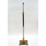 A Victorian style brass and chromed telescopic standard lamp on a square stepped base,