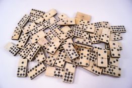 A set of Victorian nine spot bone dominoes