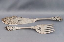 A pair of Victorian English provincial silver fish servers,